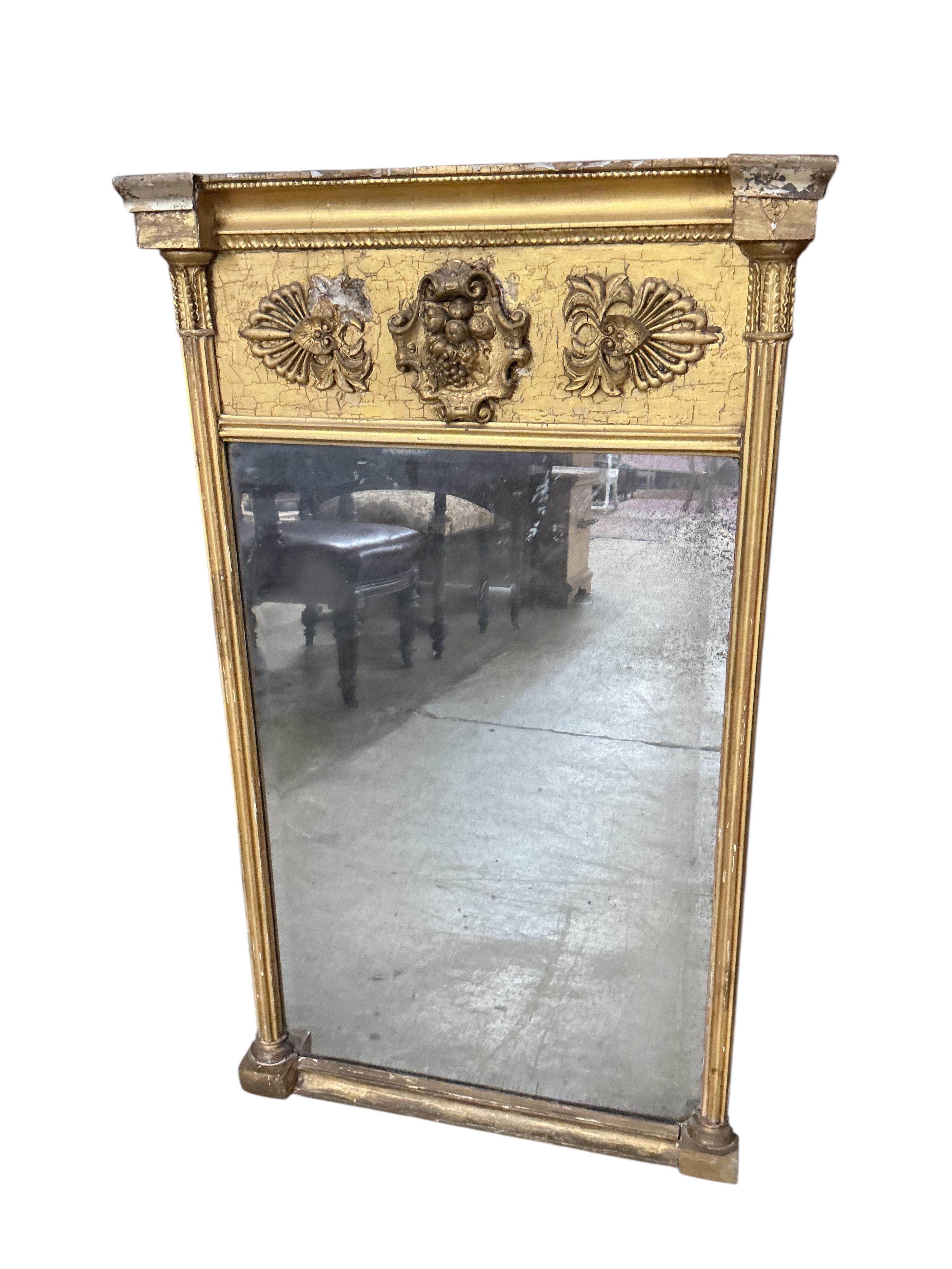 A Regency giltwood and composition pier glass, width 54cm, height 91cm